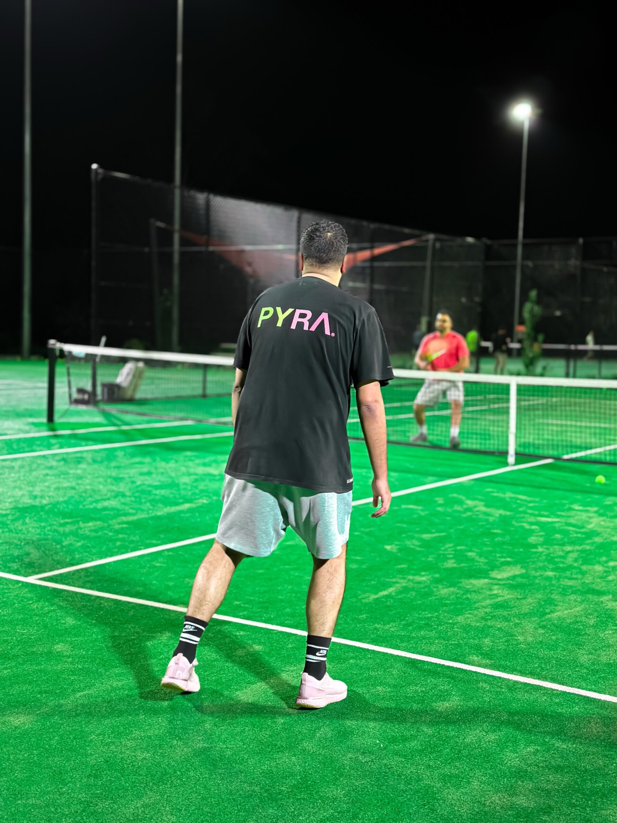 An open, well-maintained tennis court available for hourly hire